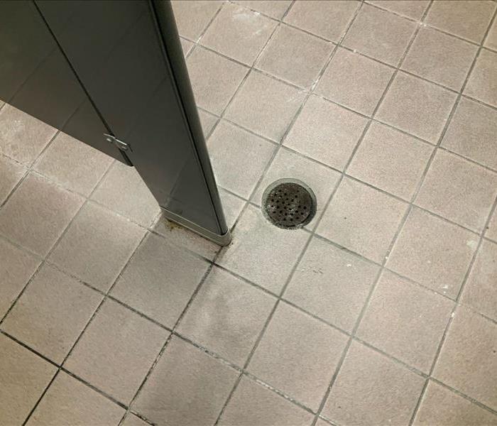 Notice how the tile looks scummy and not at a pristine condition. 