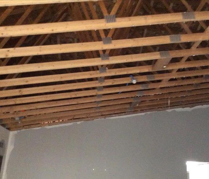 Drywall was fully removed so we could dry the wooden ceiling beams. 