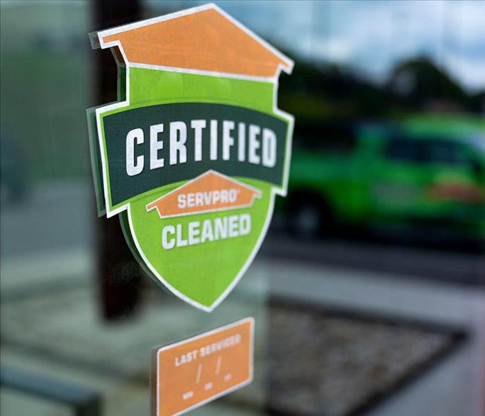 Certified: SERVPRO Cleaned Sticker on Business's Door.